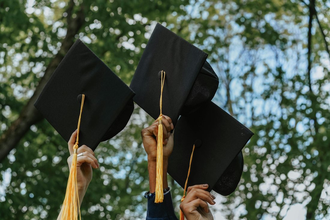 Students celebrating graduation